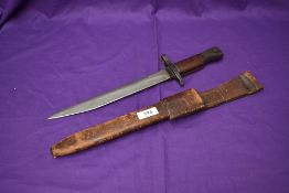 A Canadian WW1 Ross MK2 Bayonet modified with metal and leather scabbard and leather frog , pommel