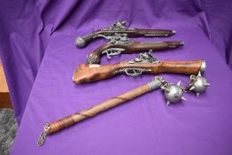 A collection of reproduction weapons including a Mace & Chain, Blunderbus Pistol and two Flintlock