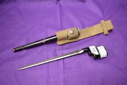 A British 1939 MK1 No4 Rifle Bayonet, with metal scabbard and webbing frog