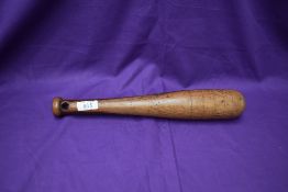 A possible WW1 hardwood turned Trench Club, two tone colour with strap hole