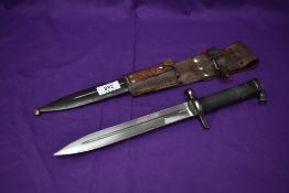 A Swedish Mauser Model 1896 Knife Bayonet with metal scabbard and leather frog, blade marked E.A.B