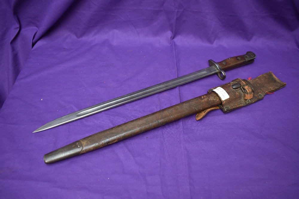 A British SMLE Bayonet pattern 1907, no hooked quillon, blade marked Crown GR 1907, 4.16, several