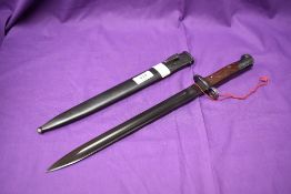 A German 1899 Bayonet Serbian Export with metal scabbard, no marking seen, blade length 28cm,