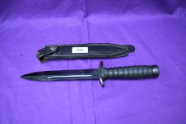 A Polish P Design Fighting Knife with leather scabbard, blade length 17.5cm, overall length 30cm