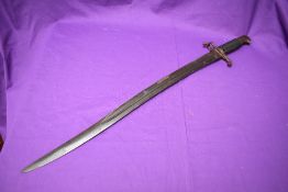 A British 1863 Pattern Whitworth Bayonet with Yatagan Blade, circular mortise slot, leather grip,