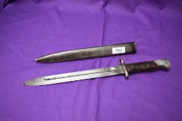 A Siam 1903 Mauser Bayonet, with Siamese marking on blade, metal scabbard, blade length 25cm,
