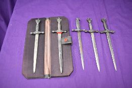 Five German style miniature Daggers including Kreigsmarine, one part cased, total lengths approx