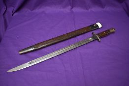 A British SMLE Bayonet pattern 1907, no hooked quillon, blade marked Crown GR 1907, 11.17 Sanderson,