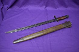 An American Bayonet for Enfield Rifle model 1913, no drain hole, marked on blade 1913, rubbed partly