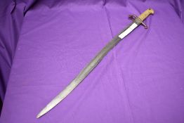 A rare British 1853 pattern Artillery Bayonet with brass grip, no scabbard, blade length 58cm,