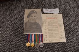 A group of four WW2 miniature medals, 39-45 Star, France Germany Star, War Medal and Defence Medal