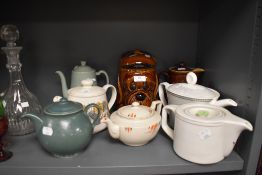 A selection of vintage and retro tea and coffee pots including Woods ware Beryl and a novelty dog