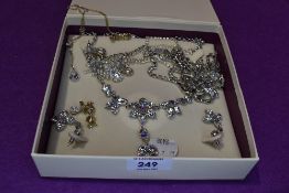 A selection of diamante jewellery including necklaces and earrings of various forms