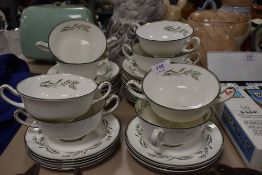 A selection of soup cups and saucers by Royal Doulton in the Spring Zephyr design