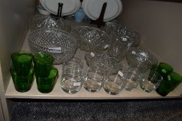 A selection of clear cut and pressed glass wares including large footed Bohemain bowl and Jade green