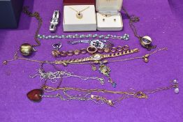 A small selection of costume jewellery including fashion watches, two cased diamante necklaces,