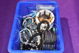 A box of bracelets of various forms