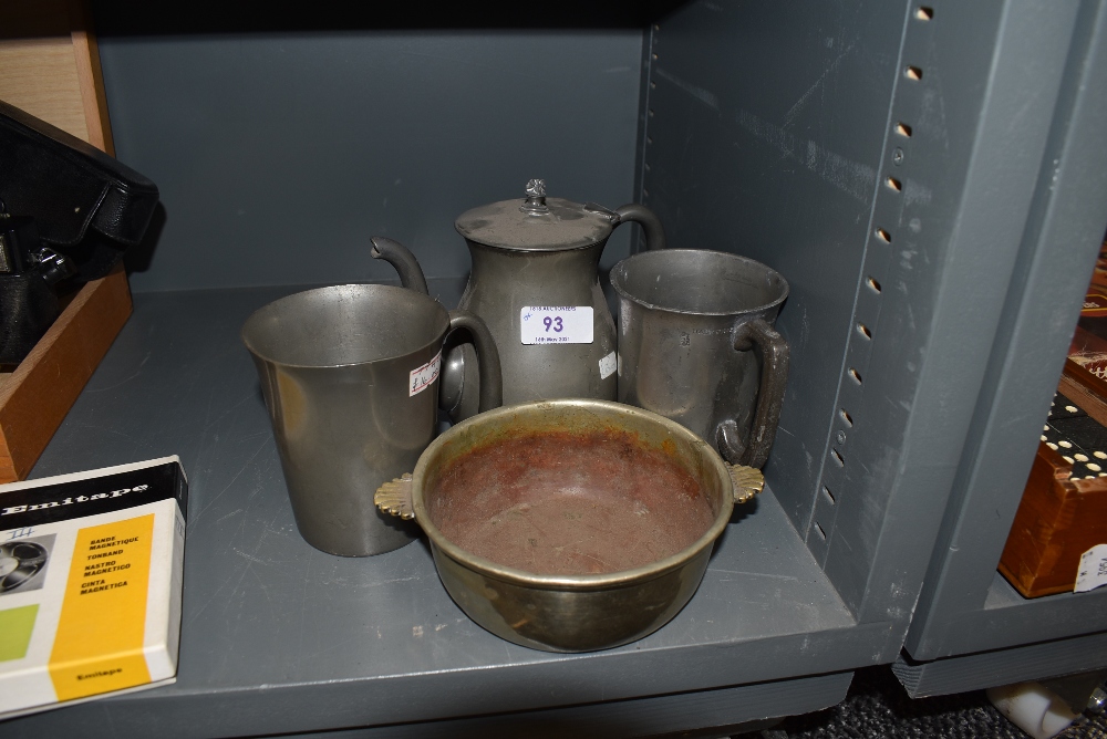 A collection of pewter and similar items including tankard with touch marks and antique porringer.