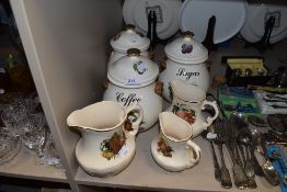 A selection of ceramic printed storage jars and similar water jugs