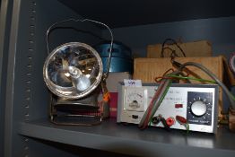 A vintage Desmo universal heater, a DC power supply and torch/lantern.