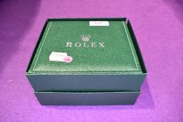 A copy Rolex watch case and box