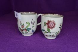 A pair of late 18th century Worcester style chocolate cups having floral pattern and burgundy