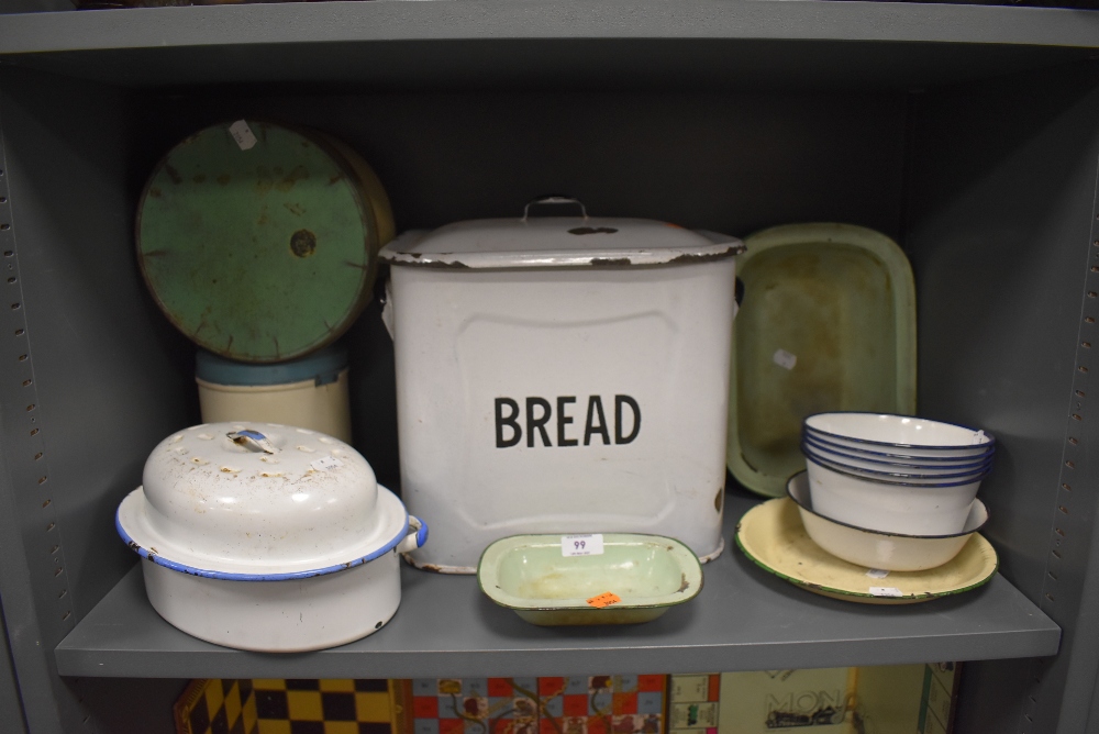 A variety of vintage enamel kitchenalia including bread bin,cake tin and more.