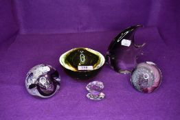 A selection of art glass paper weights and tropical fish figure