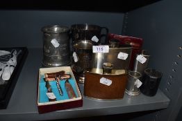 A boxed vintage corkscrew set,tankards,hipflasks and more.