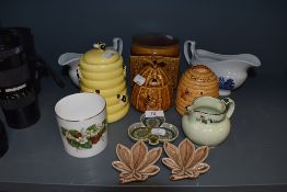 A selection of Honey pots and similar mixed ceramics.