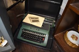 A Silver Reed 500 typewriter in case.