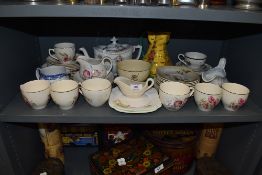 A mixed lot of general ceramics including cups and saucers, jug,tea pot and more.