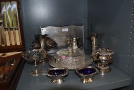 A small selection of silver plated items including cut glass and plate butter dish, sugar scuttle,