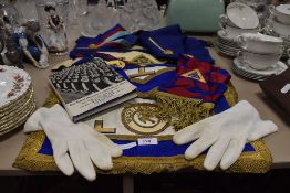 A selection of female Masonic regalia including tabard and medallion