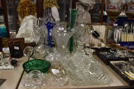 A selection of clear cut and crystal pressed glass wares including colour splash style vase and