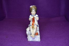 A Royal Worcester figurine entitled Saturdays child works hard for a living.