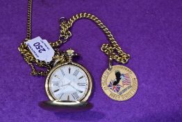 A gold plated Limit Hunter pocket watch with watch chain and medallion inscribed Oklahoma Masonic