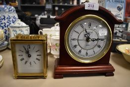 A brass cased carriage clock by Smiths and similar Highlands mantle clock