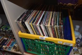 A selection of vinyl albums including rock and pop mostly eighties interest