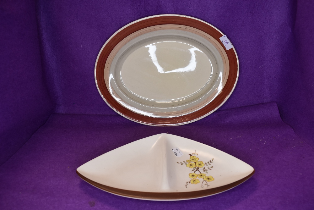 A Carelton ware serving dish and similar Susie Cooper dinner charger