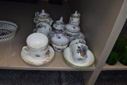 A selection of teacups and saucers including Spode Rockingham tea set