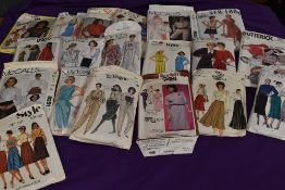 An assortment of 1980s sewing patterns.