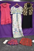 A mixed lot of ladies clothing including 1960s maxi dress and 1960s pink mini dress amongst others.