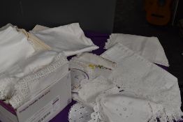 A lovely collection of vintage, antique and retro table linen including deep crotchet edged table