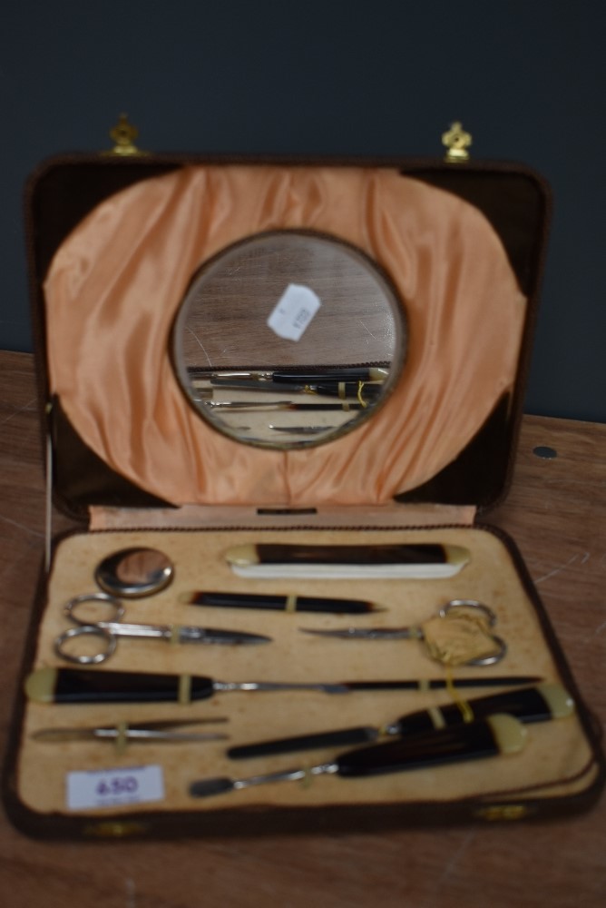 A vintage manicure set in original box with swig tags still attached.