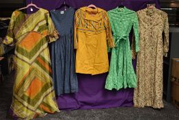 A selection of vintage dresses including Laura Ashley and Jean Varon in a variety of colours and