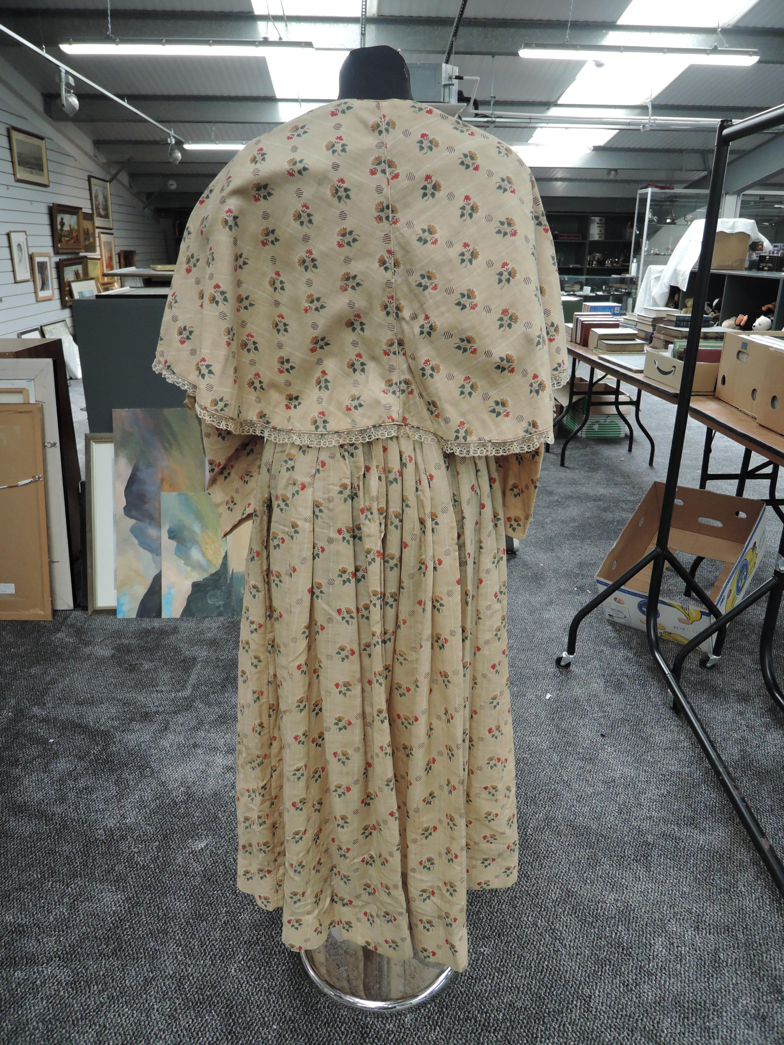 A Victorian cotton dress and lace edged cape having floral print on beige ground, superb details - Image 2 of 10