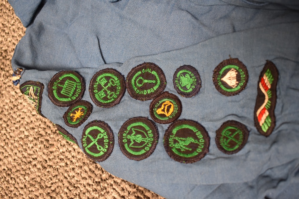 A 1960s girl guides blouse with badges and a copy of the guide book. - Image 2 of 2