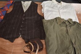 A collection of gents clothing and accessories including waistcoat and shirts.