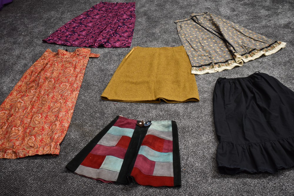 An assortment of colourful vintage skirts,predominantly 60s and 70s including wonderful patchwork